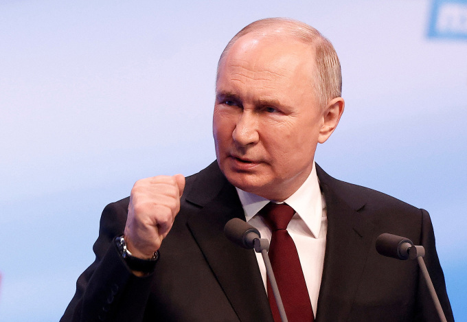 Tổng thống Nga Vladimir Putin phát biểu tại thủ đô Moskva ngày 18/3, sau khi các điểm bỏ phiếu đóng cửa. Ảnh: Reuters